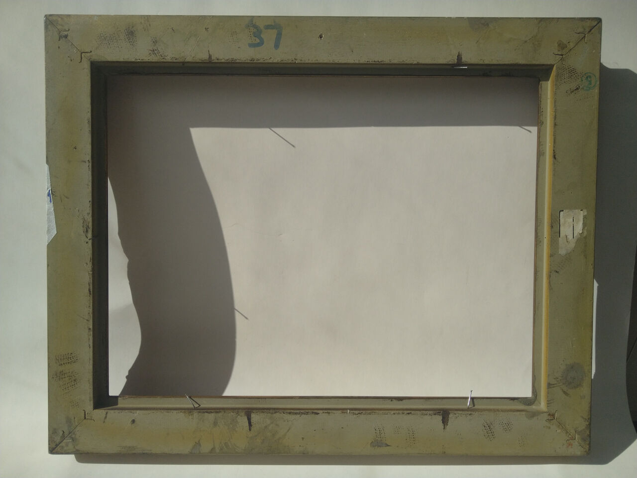 Golden sculpted frame for photo or artwork