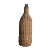 Green glass bottle and rattan