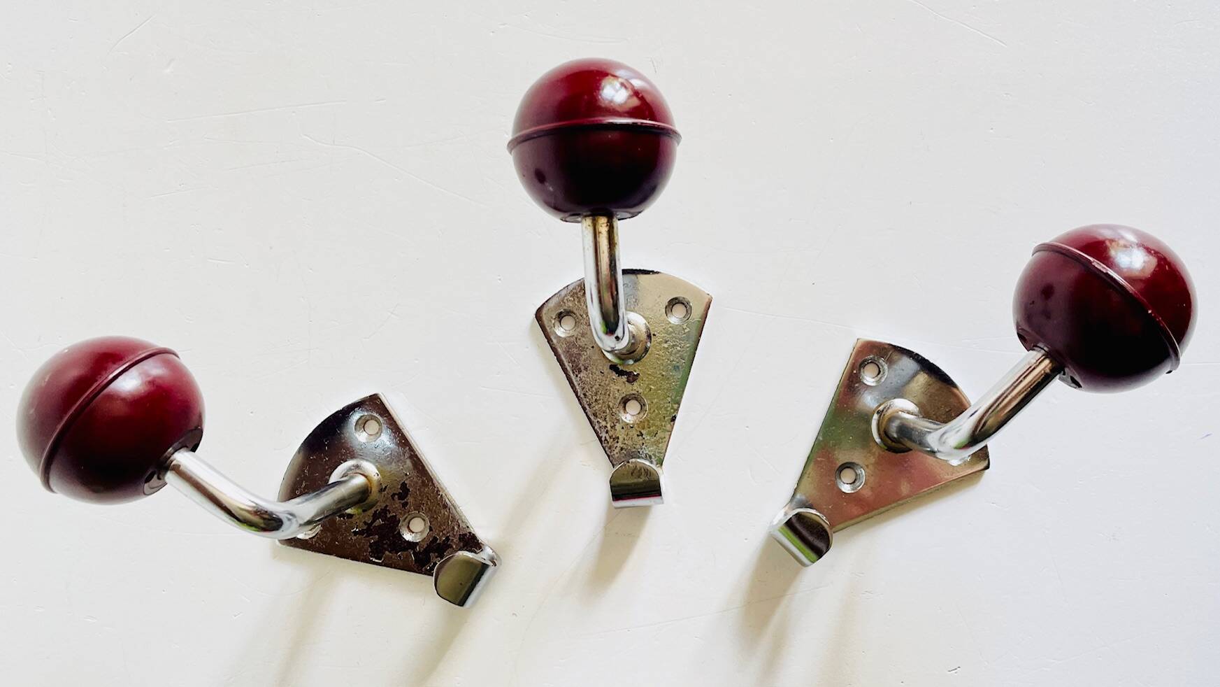 Chrome and bakelite coat hooks from the 70s
