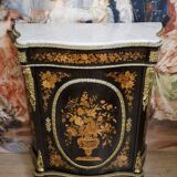 Boulle furniture with a curved shape from the Napoleonic III era in lacquered wood and marquetry.