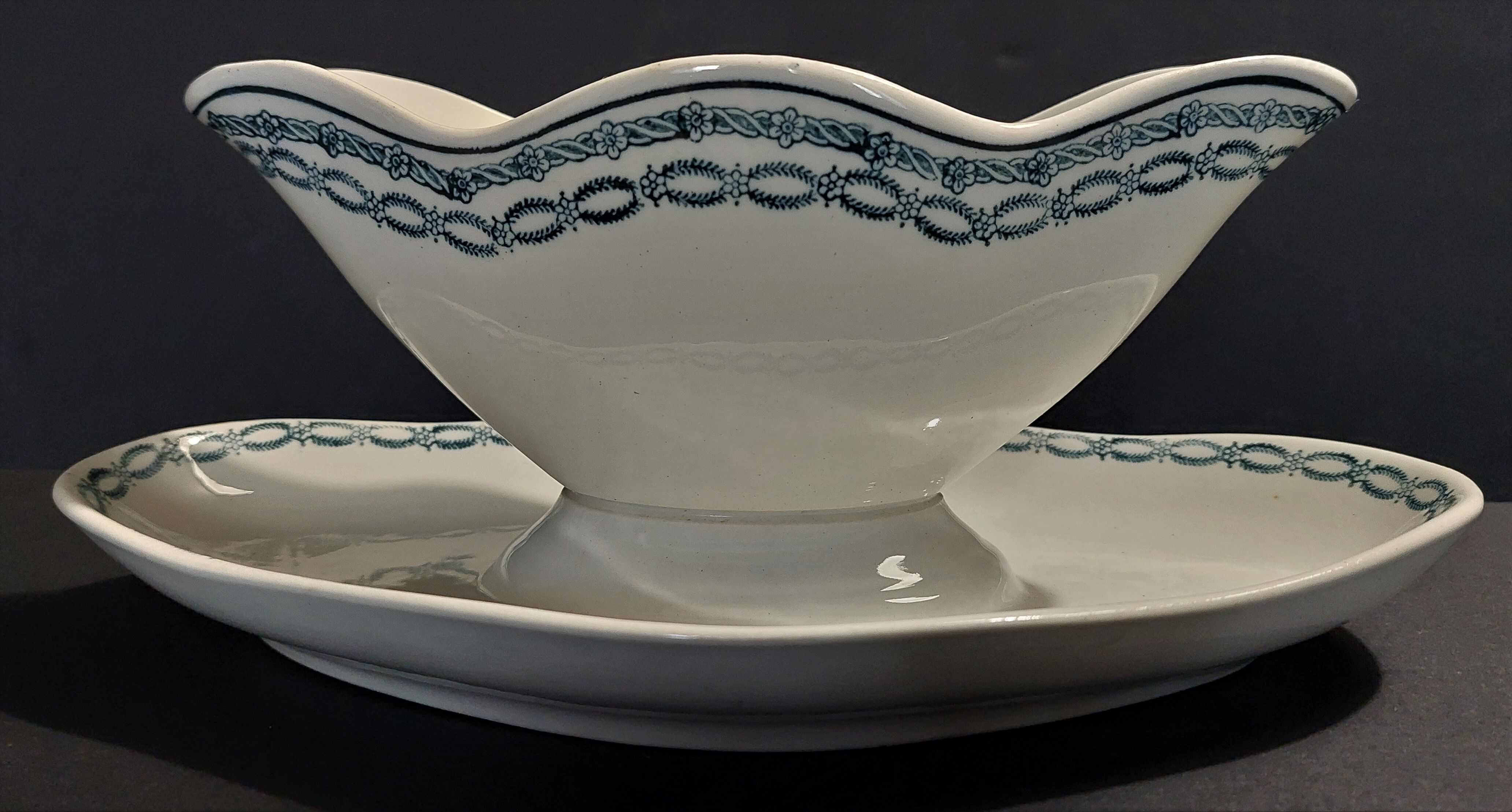 Faience sauce boat from Saint Amand