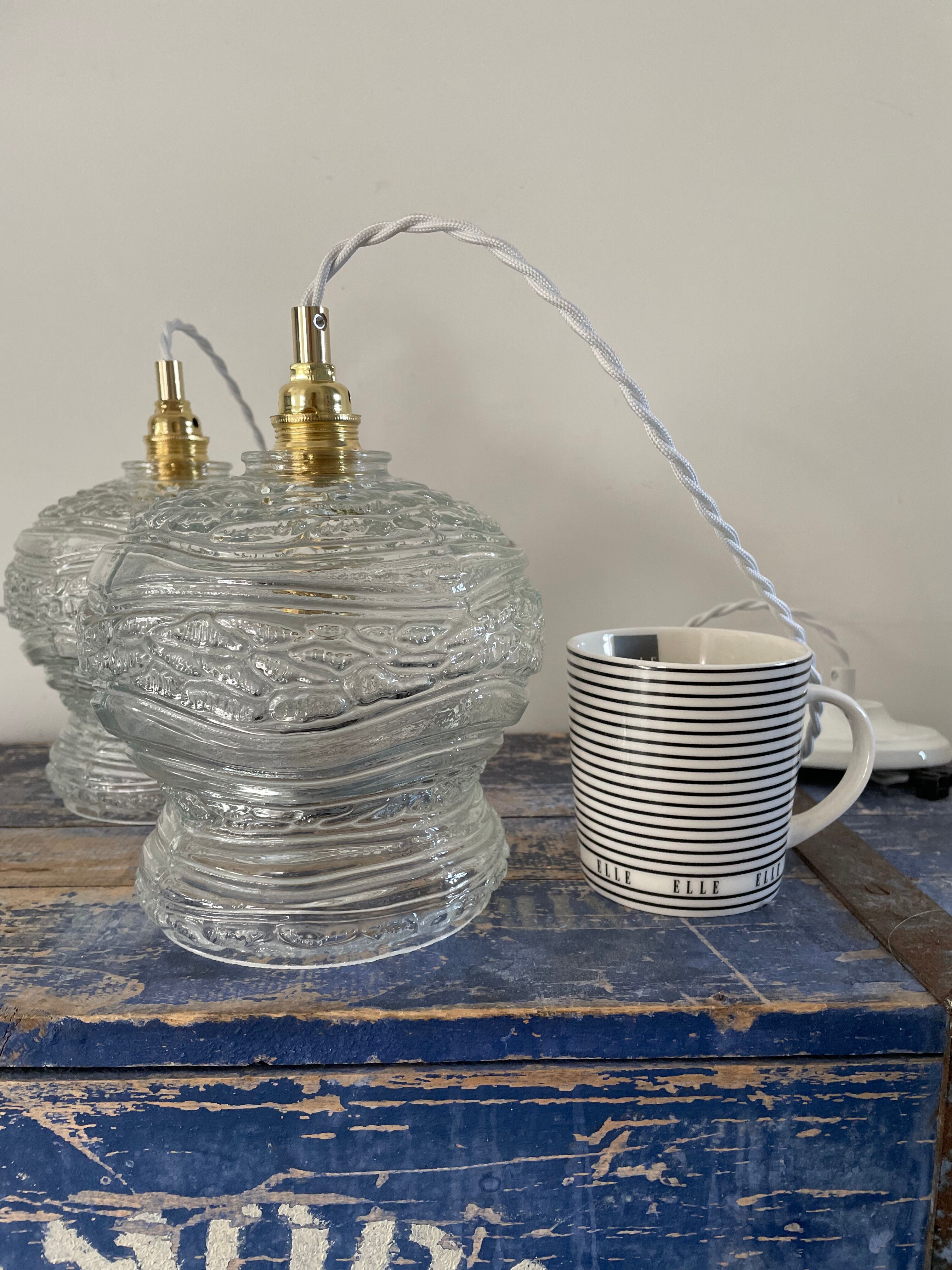 Set of two vintage electrified glass pendant lamps