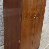 Wardrobe on a plinth in walnut and walnut veneer circa 1940.