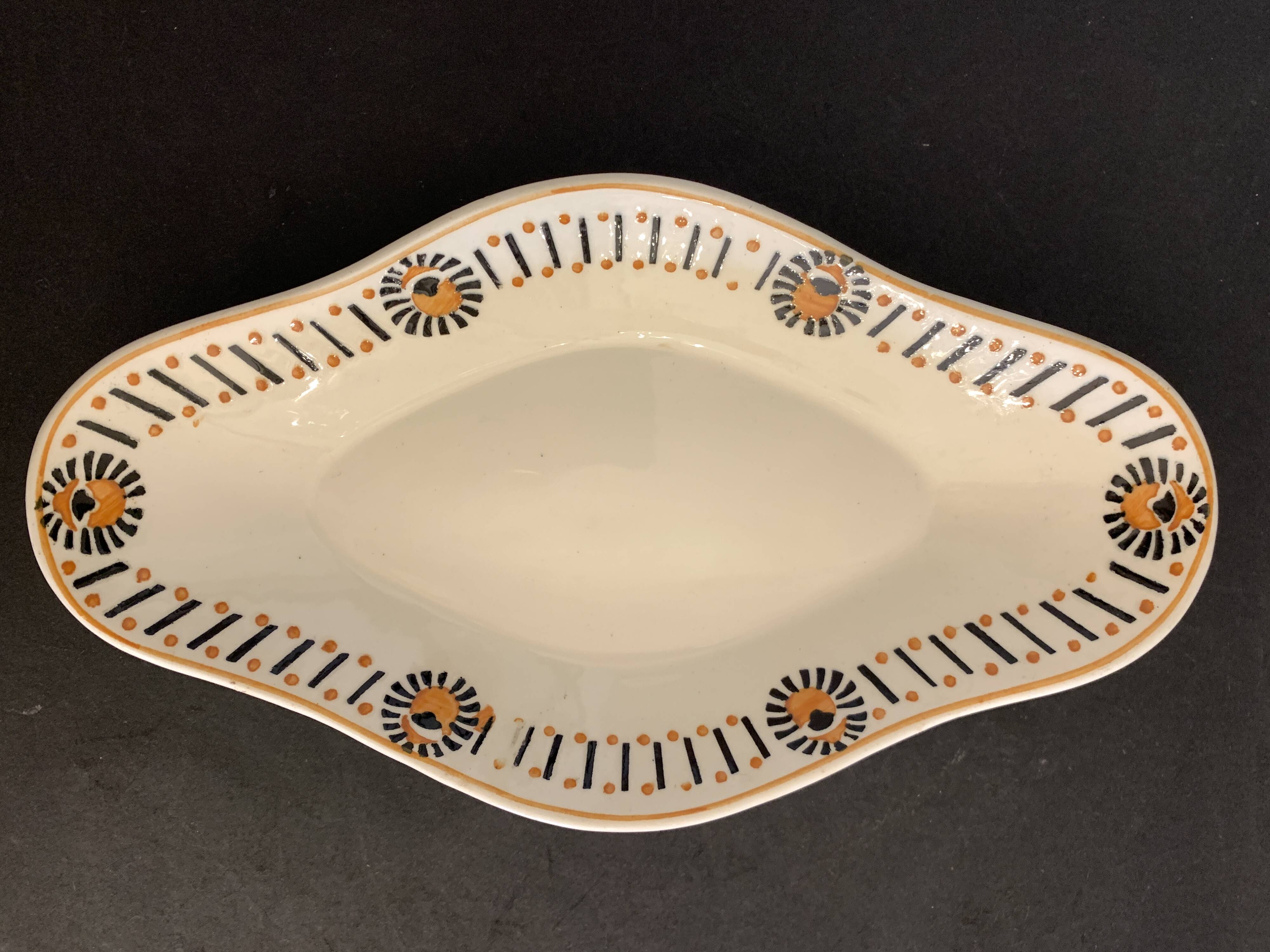 Pair of art deco raviers signed Longwy and numbered, model Gerazine