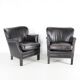 Pair of small leather club armchairs
