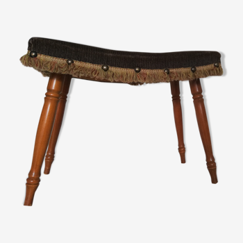 Stool with studs and fringes