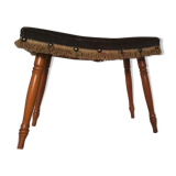 Stool with studs and fringes