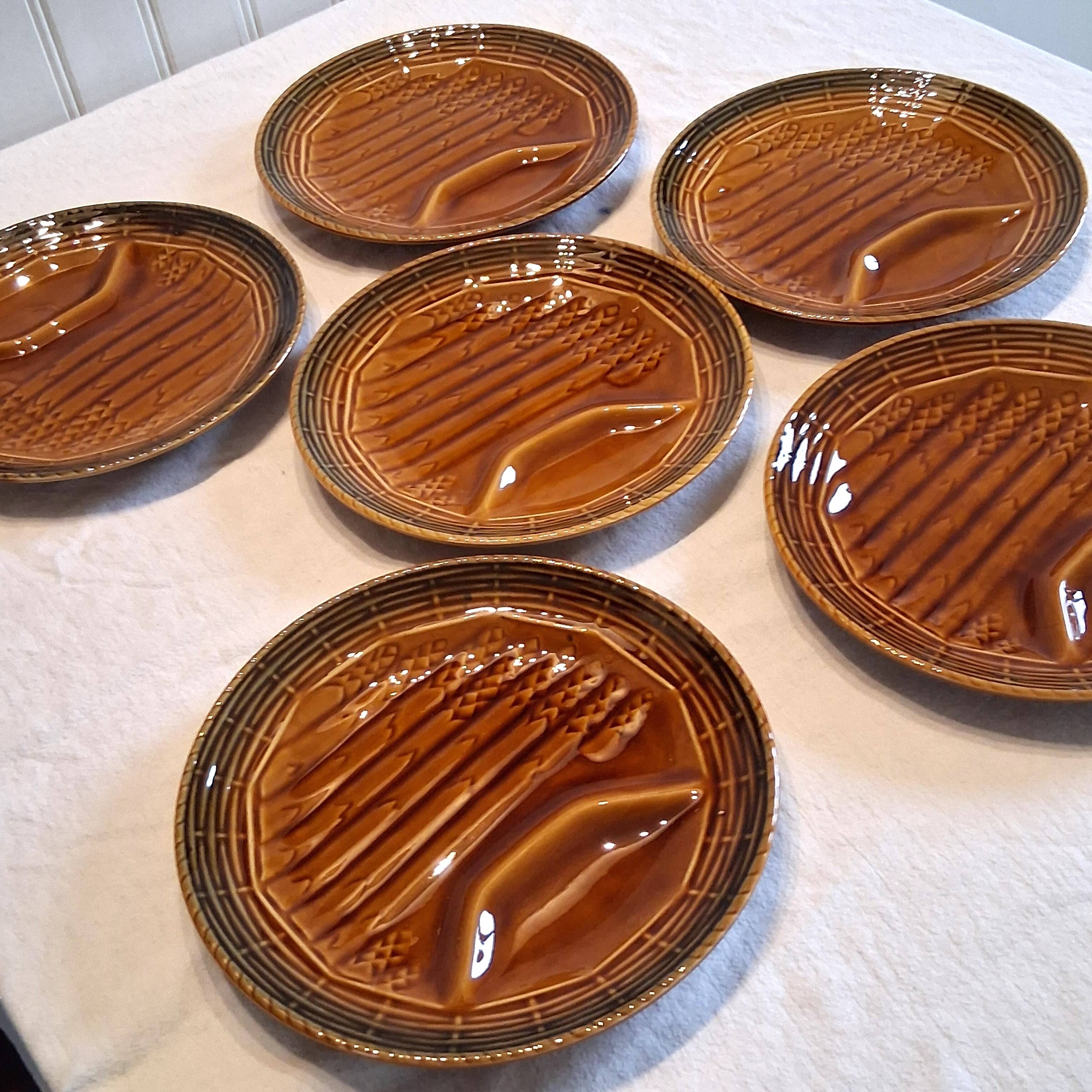 6 asparagus plates stamped "Sarreguemines" on the back in very good condition.