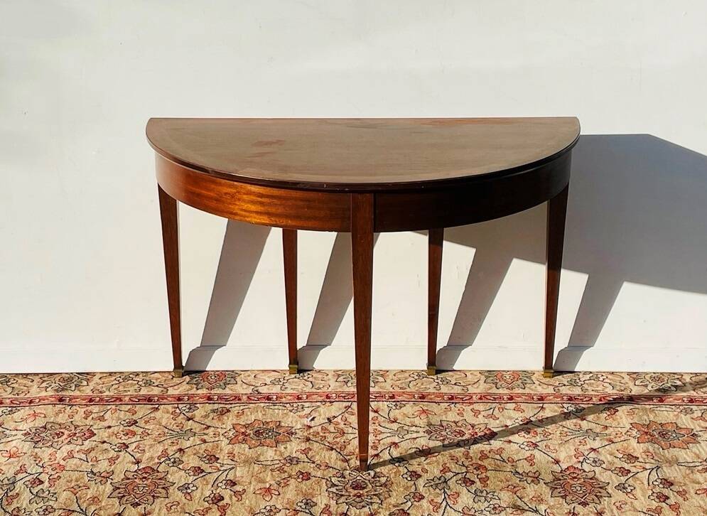 Empire-style demi-lune console from the 19th century.