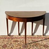 Empire-style demi-lune console from the 19th century.