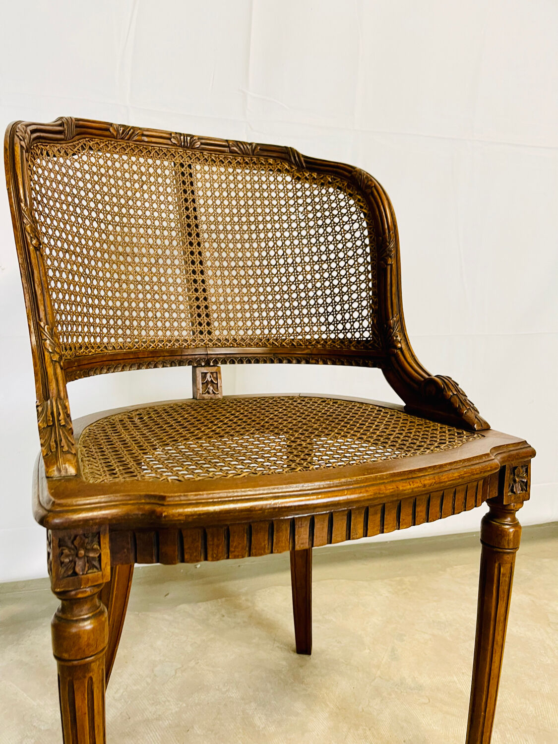 Small cané armchair