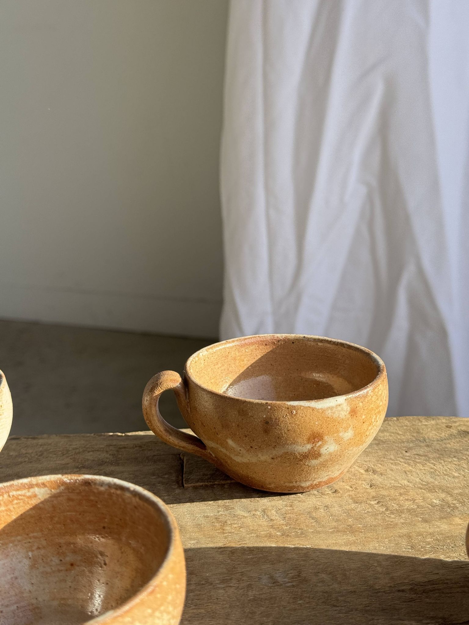 11 tasses à café vintage en grès mat brut
