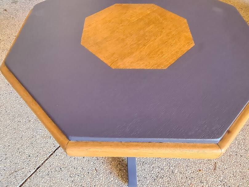 Octagonal wooden coffee table with central leg