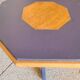 Octagonal wooden coffee table with central leg