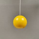 Spherical pendant lamp in sunny yellow.