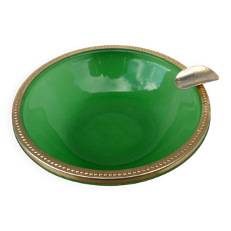Green glass ashtray set in gold brass