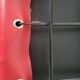 Red leather dining chairs by Arper