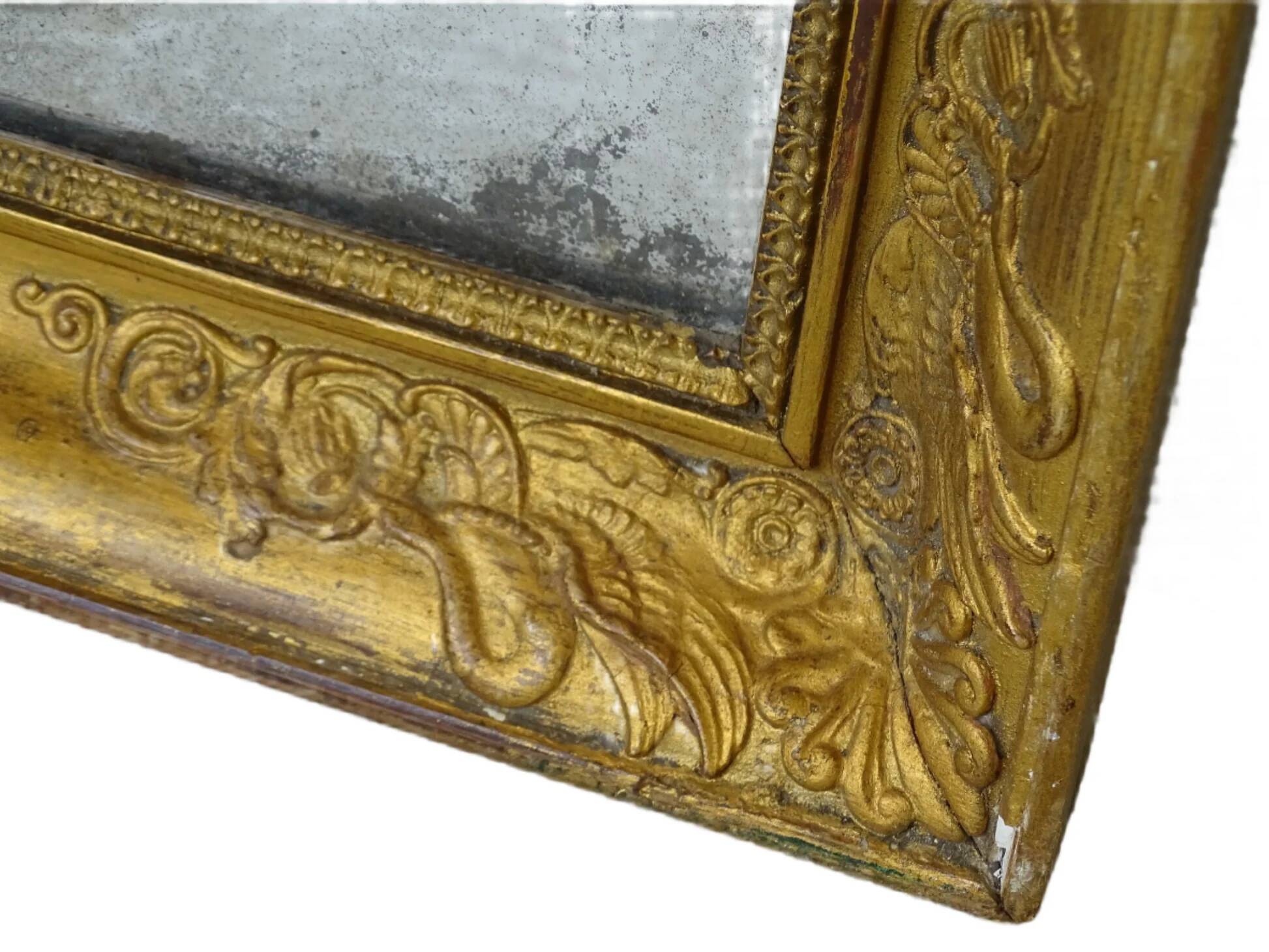 Miroir français ancien à cadre doré orné de cygnes, époque de la Restauration