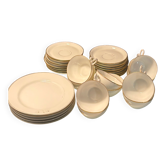 Porcelain tea service (Limoges) 35 pieces monogrammed with gold trim.