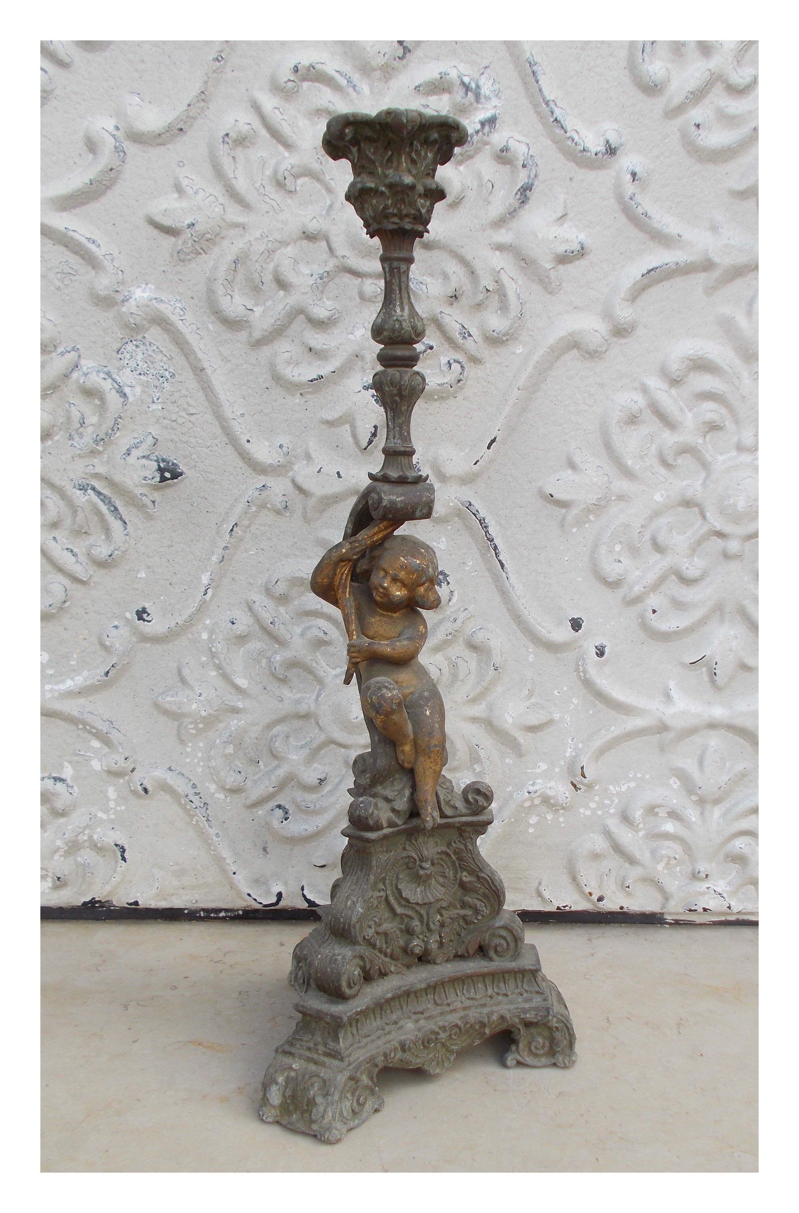Bougeoir ancien putto regule