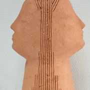 Anthropomorphic lamp foot depicting two faces terracotta design 80s