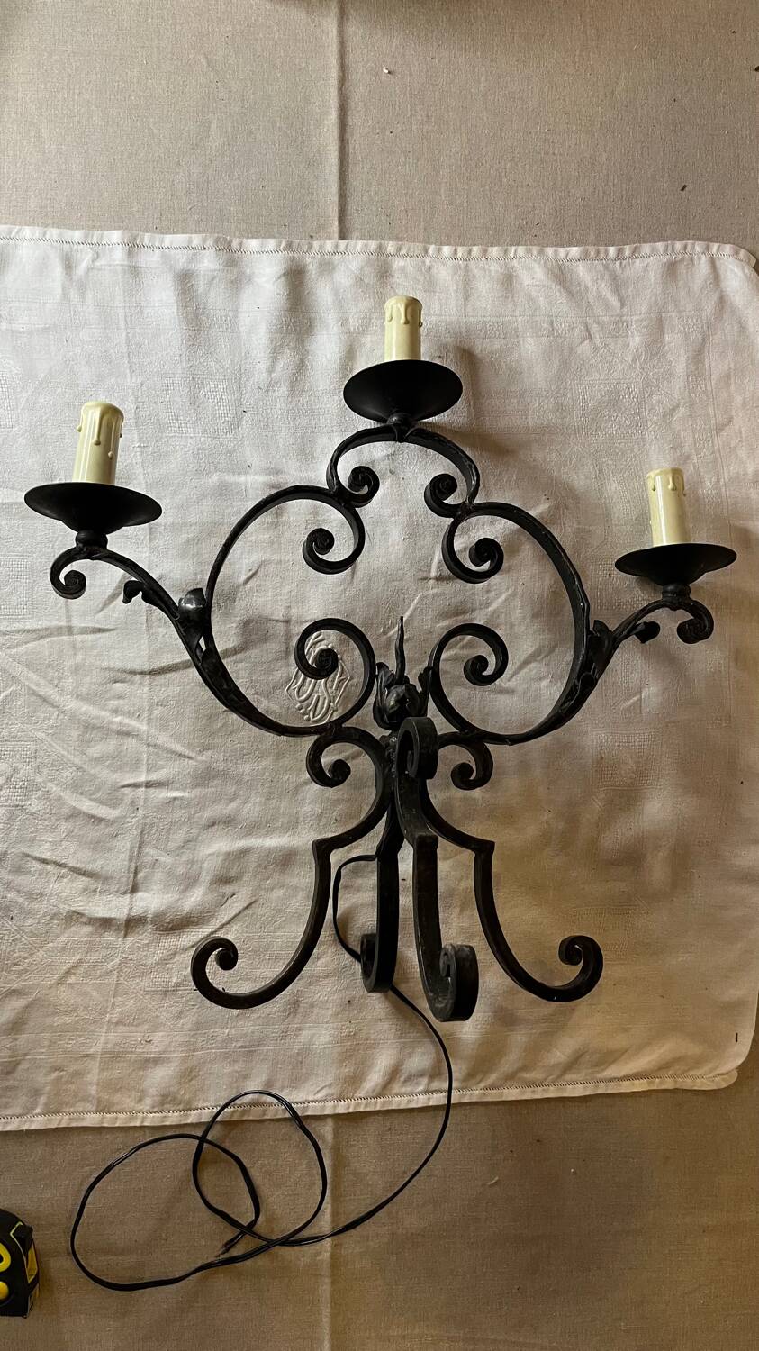 Pair of 3-light wrought iron candlesticks on vintage legs