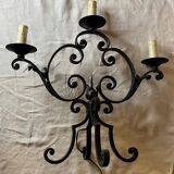 Pair of 3-light wrought iron candlesticks on vintage legs