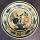 Assiette ancienne en faïence hb henriot quimper décor de panier floral et oiseau