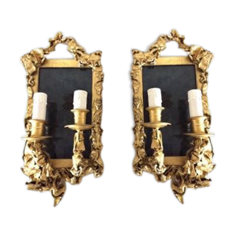 Pair of wall appliques, gilded brass creation of the 1970s"