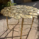 Carved brass coffee table with ginkgo decor