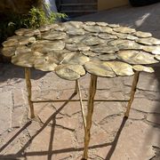 Carved brass coffee table with ginkgo decor