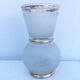 White and gold vase