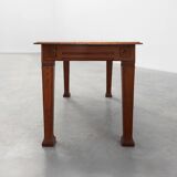 Oak Art Deco dining table with carved frieze, France 1920s