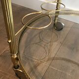 Neoclassical style rolling table in brass