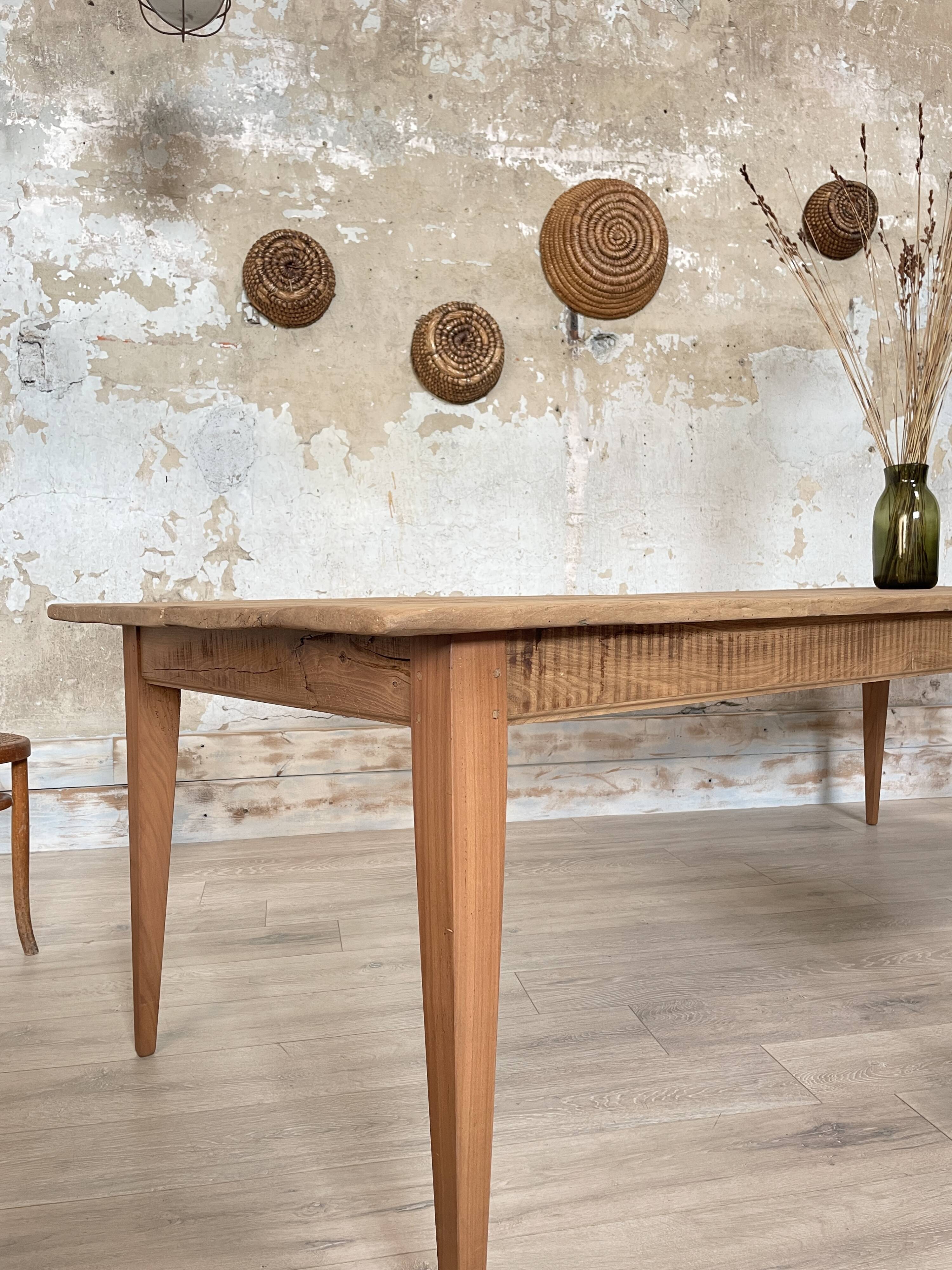 Vintage farm table with spindle legs.