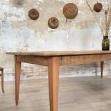 Vintage farm table with spindle legs.