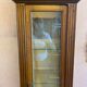 Walnut showcase, grooved uprights, 4 glass shelves