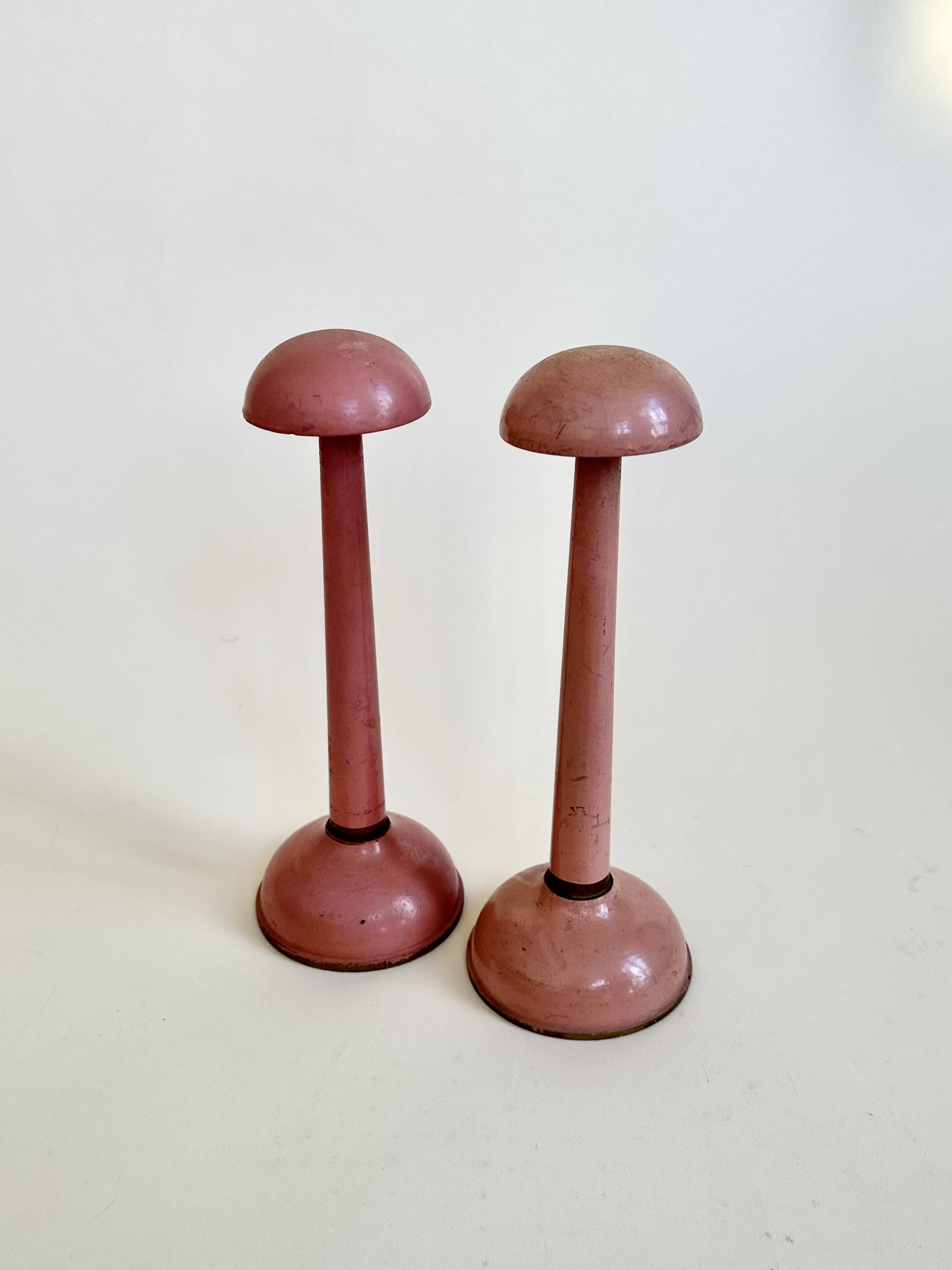 Pair of antique wooden hat stands
