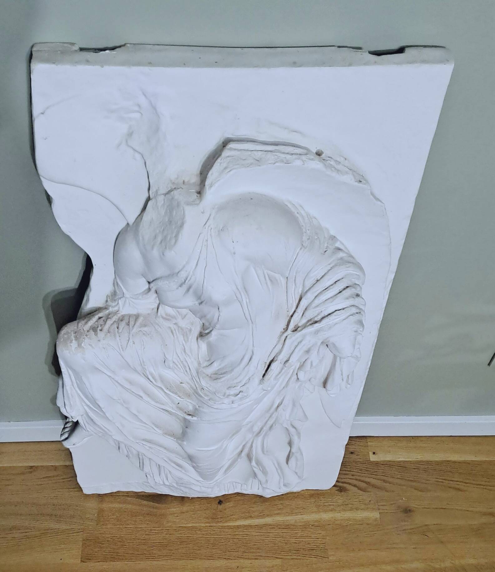 Plaster bas relief "Athena adjusting her sandal"