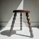 low tripod stool in turned wood, France 1960