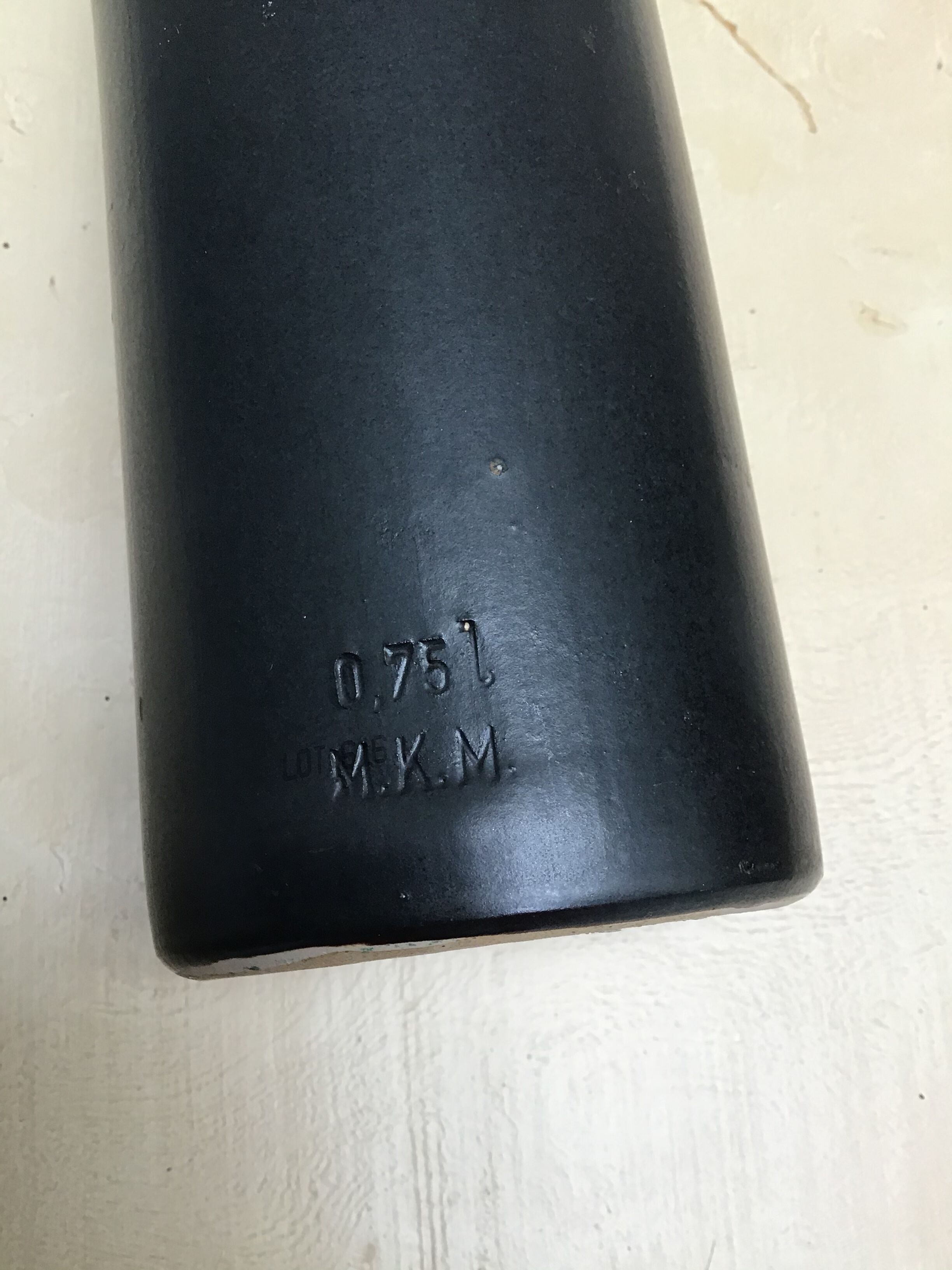 M.K. sandstone bottle.M.