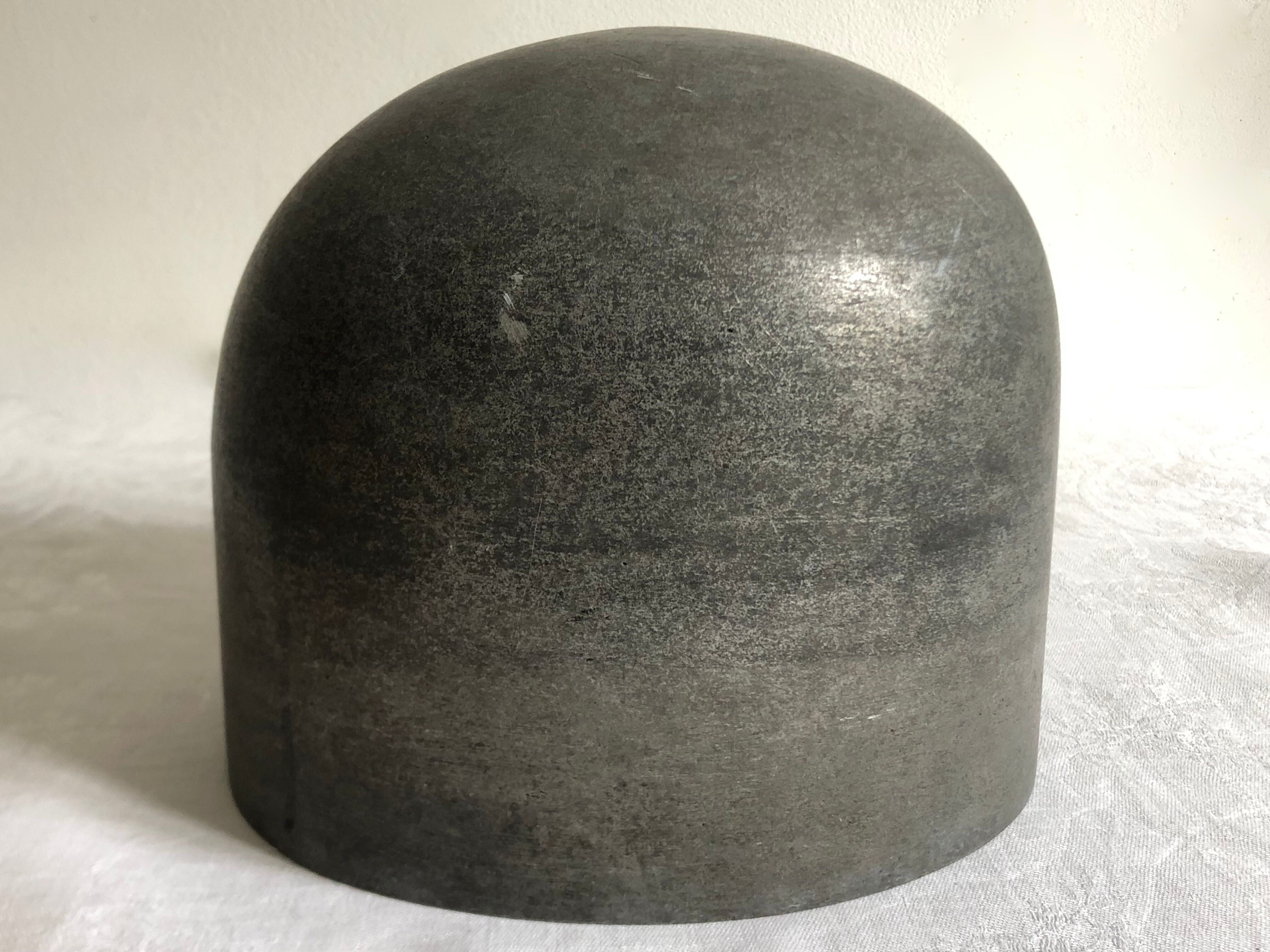 Hat shape in cast aluminum