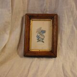 Wooden frame and gilding, laurier linen