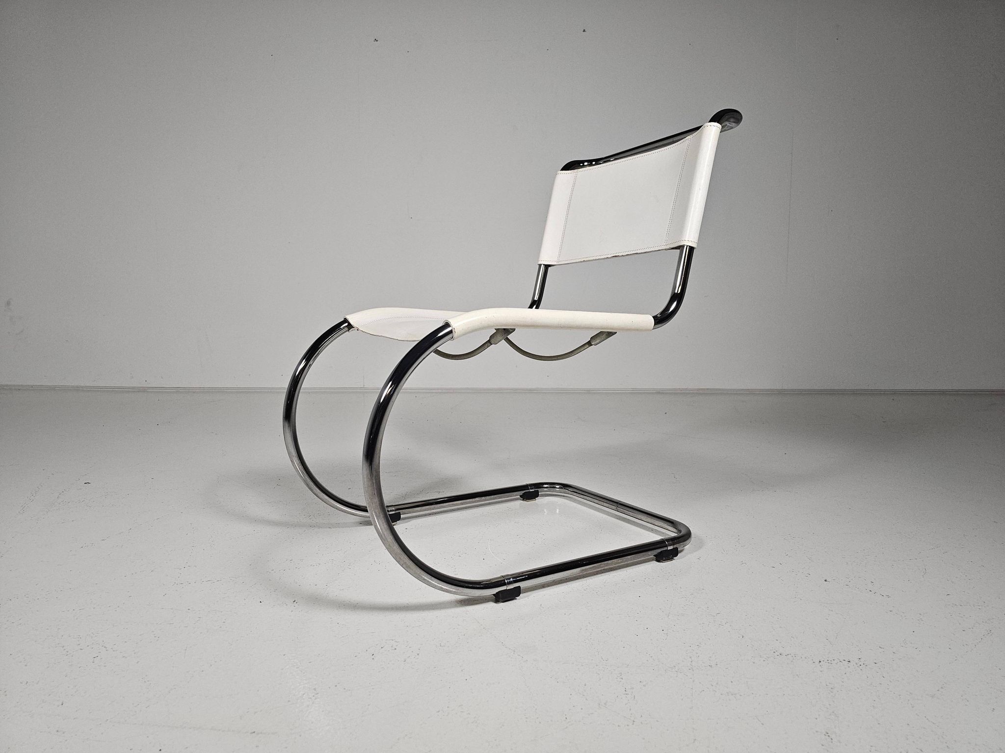 Set of 6 white cantilever dining chairs MR10 by Mies van der Rohe for Thonet, 1980s.