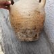 Old terracotta pot with two handles