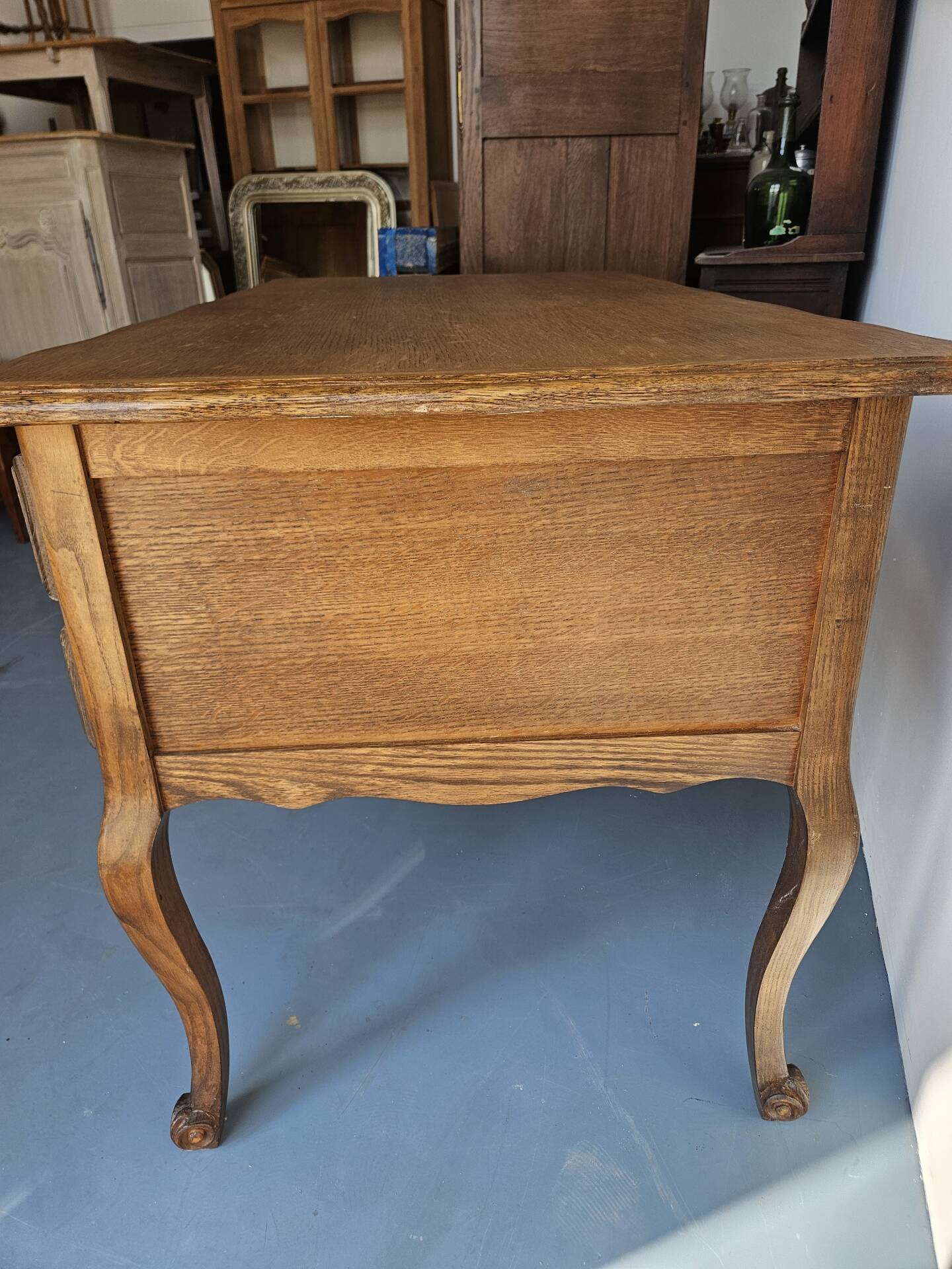 Antique wooden desk with 4 drawers.