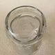 Small carafe in blown cut glass with engraved decoration of vine leaves and grapes, threaded stopper