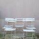 Series of 6 chairs and 1 folding armchair of iron garden bistro