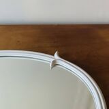 Oval mirror in vintage enameled white cast iron