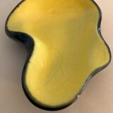 Yellow and black ceramic ashtray